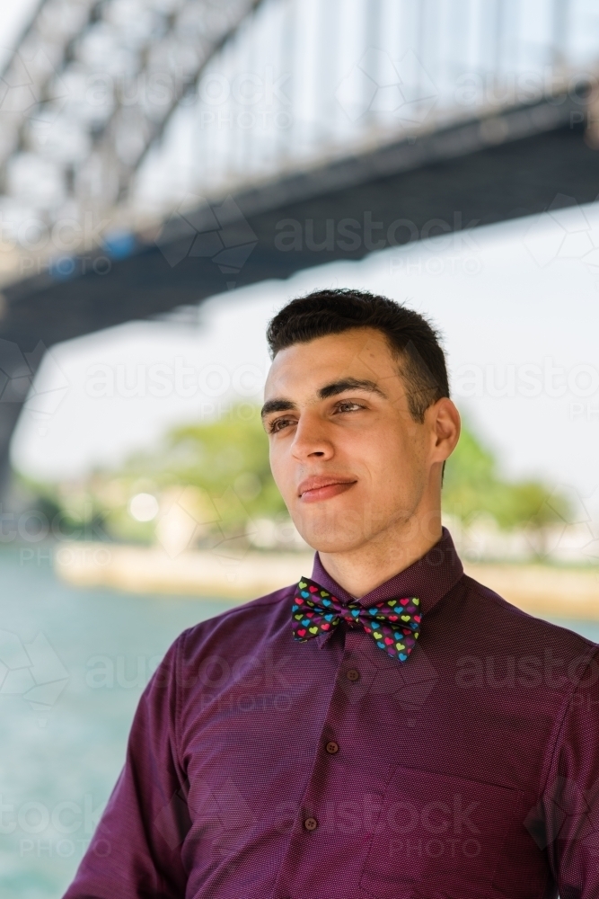 young man wearing fun bow tie - Australian Stock Image