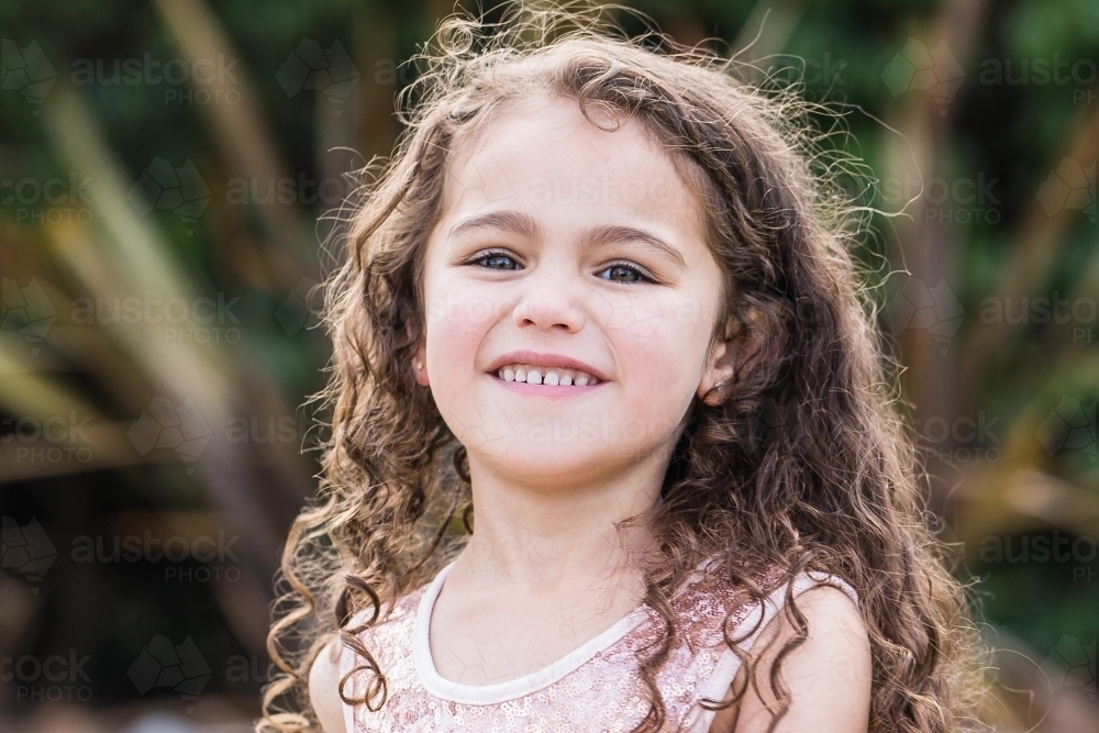 Young mixed race aboriginal caucasian girl smiling - Australian Stock Image