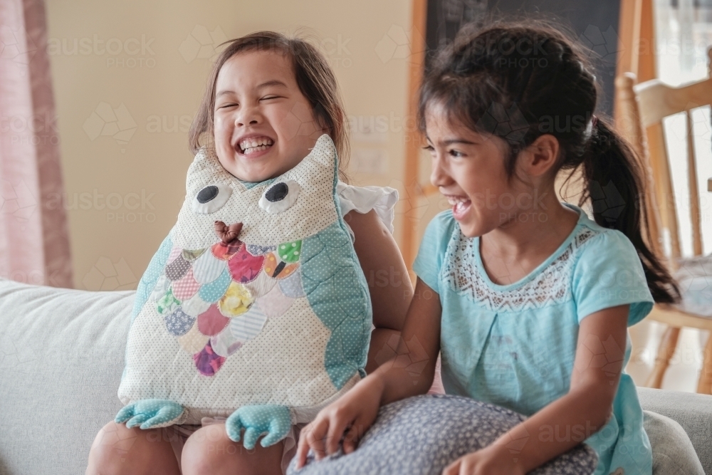 Young multicultural girls having a laugh - Australian Stock Image