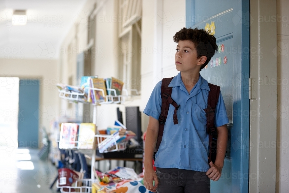 Young school boy at school classroom - Australian Stock Image