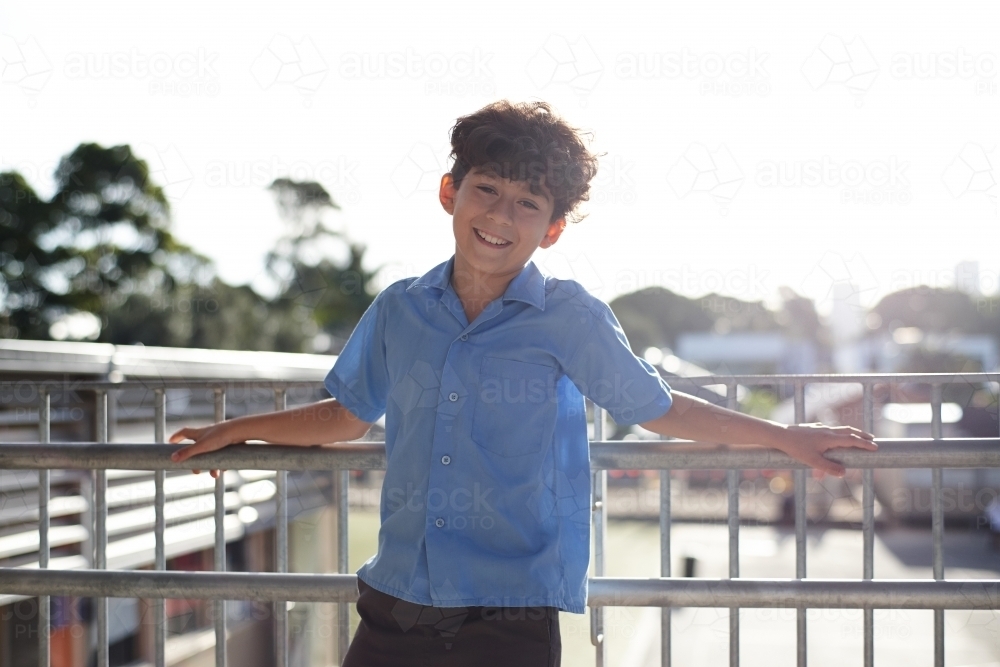 Young school boy in uniform smiling - Australian Stock Image