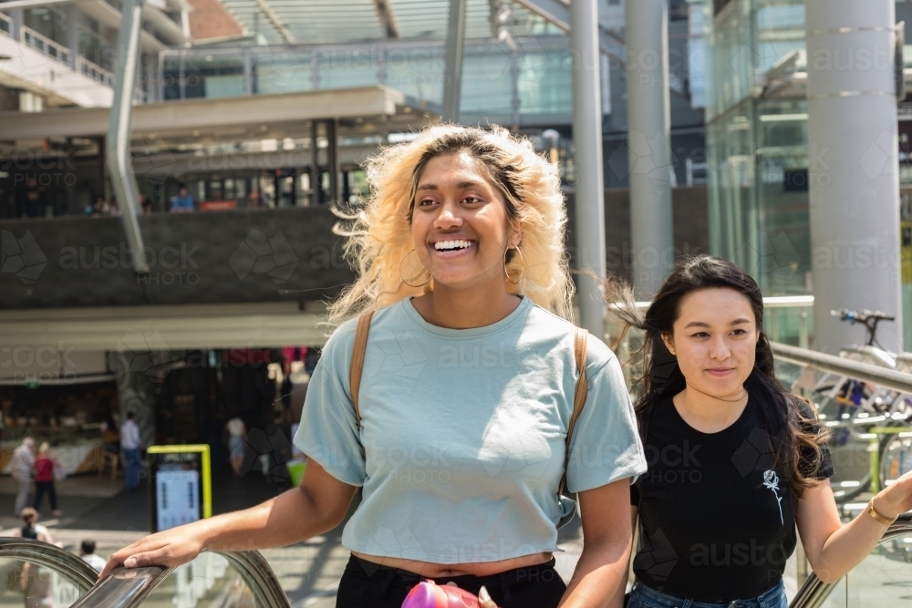 young students at the train station - Australian Stock Image