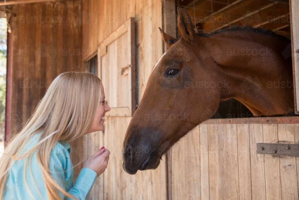 Young Woman and Her Horse - Australian Stock Image