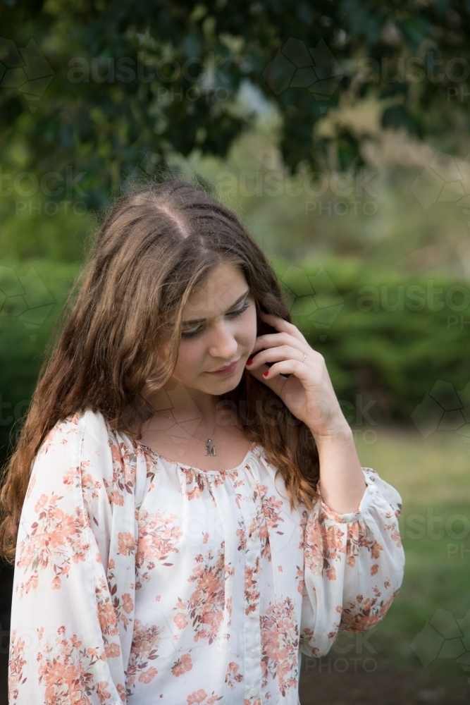 Young woman deep in thought - Australian Stock Image