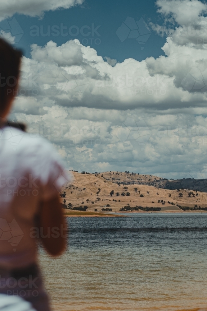 Young woman enjoying mountain views over Lake Hume - Australian Stock Image