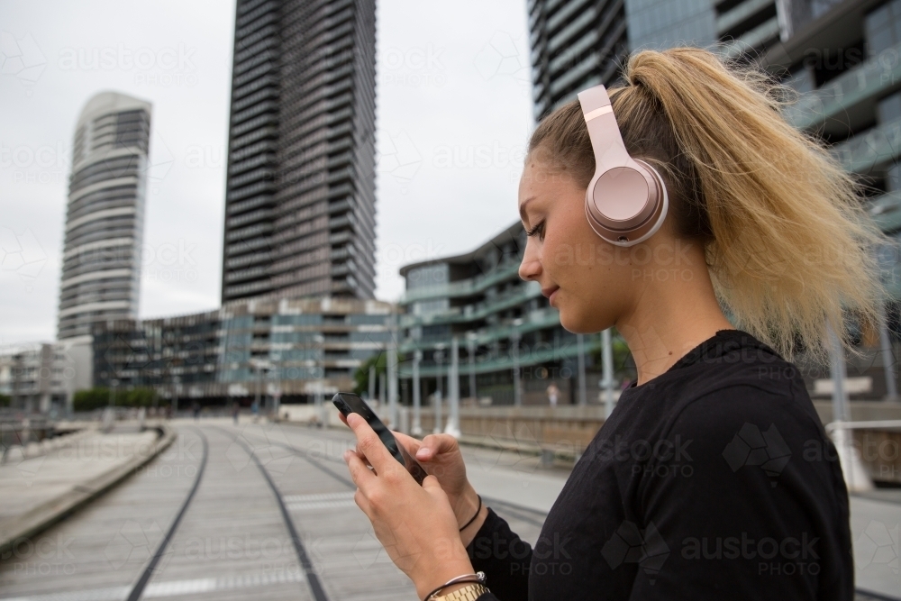 Young Woman Heading out on Morning Walk - Australian Stock Image