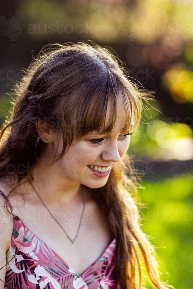 Young woman looking down - Australian Stock Image
