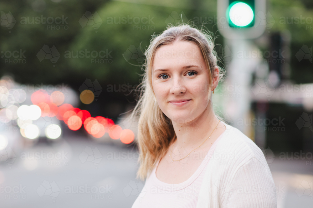 young woman portrait in urban street setting - Australian Stock Image