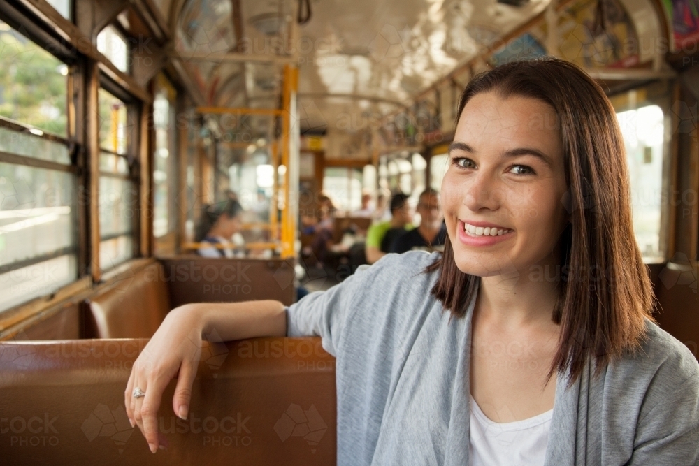 Young Woman Riding the City Circle Tram - Australian Stock Image
