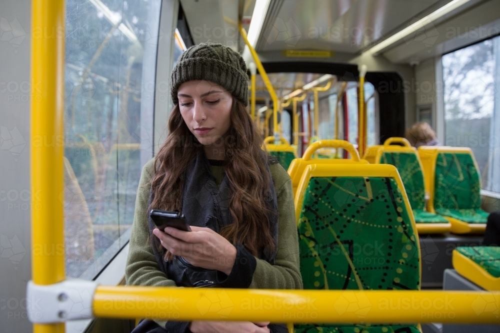 Young Woman Riding the Tram - Australian Stock Image