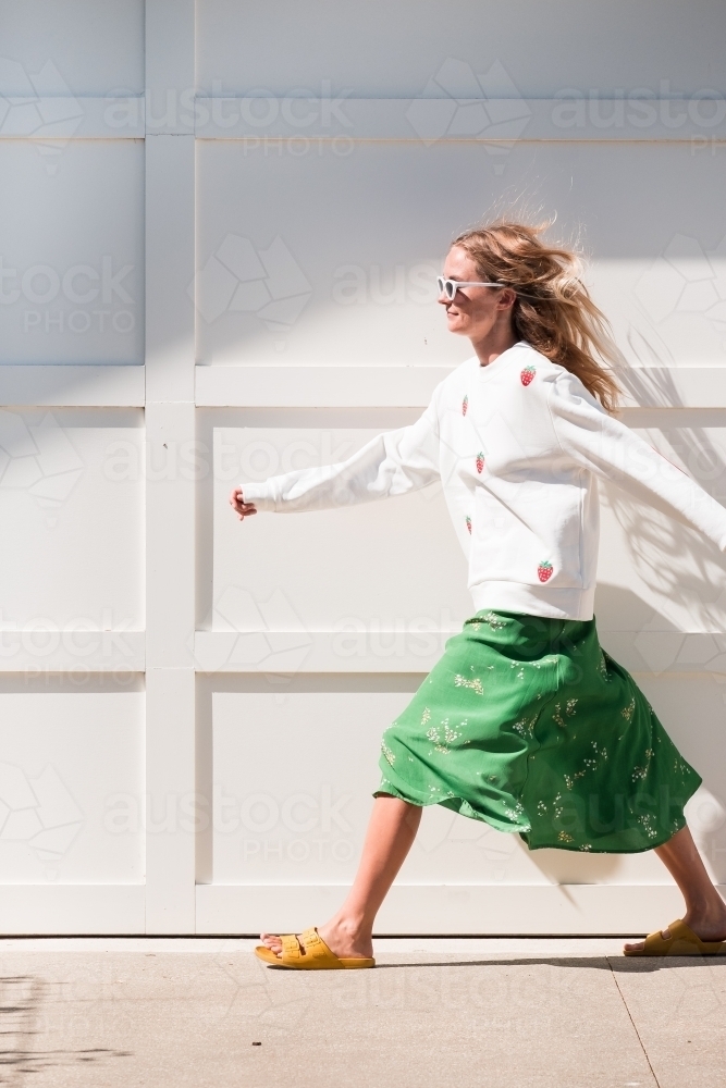 Young woman walking - Australian Stock Image