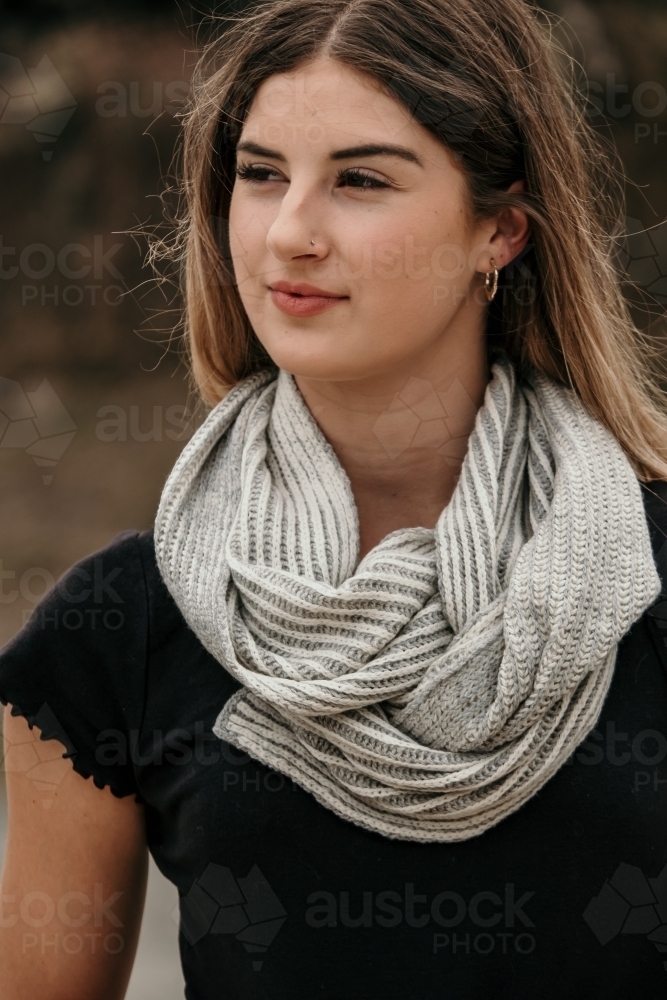 Young woman wears a scarf - Australian Stock Image