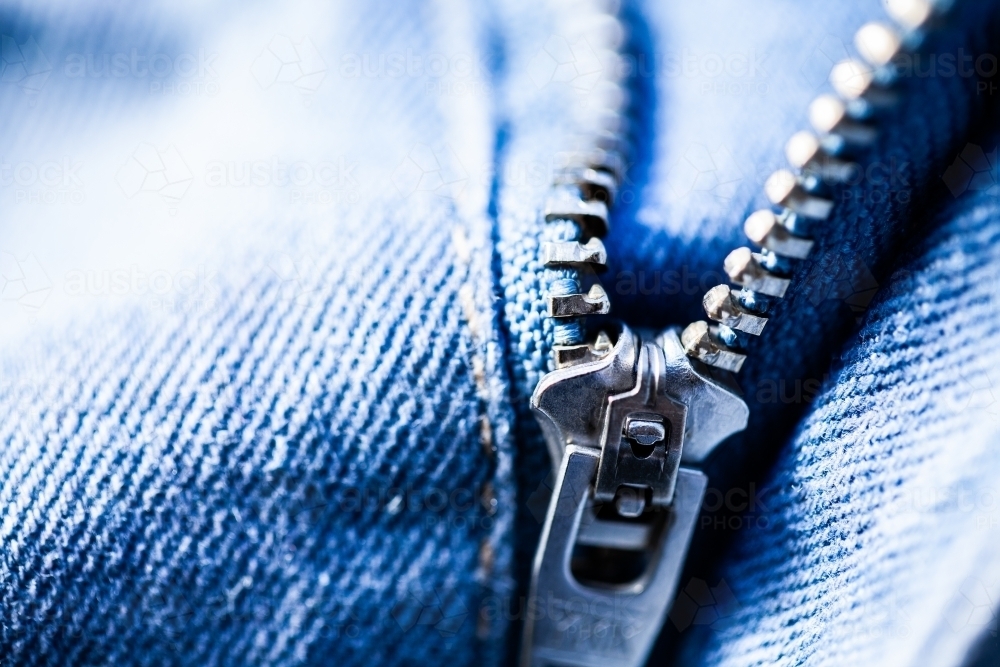 Zipper on denim clothing - Australian Stock Image