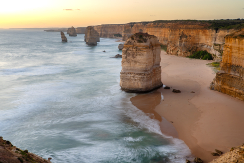 12 Apostles with sun below horizon - Australian Stock Image