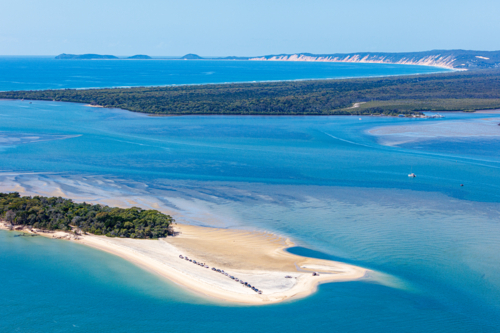 4wd vehicles waiting for ferry to K'Gari, Fraser Island - Australian Stock Image
