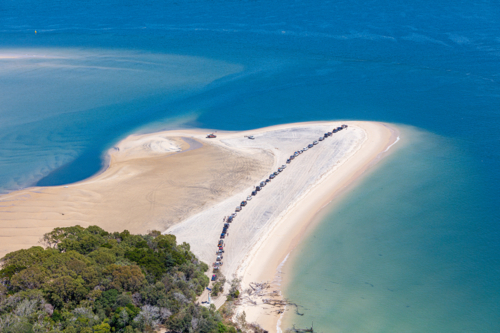 4wd vehicles waiting for ferry to K'Gari, Fraser Island - Australian Stock Image