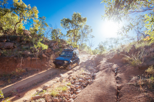 A 4WD car negotiating a rural track in the outback - Australian Stock Image