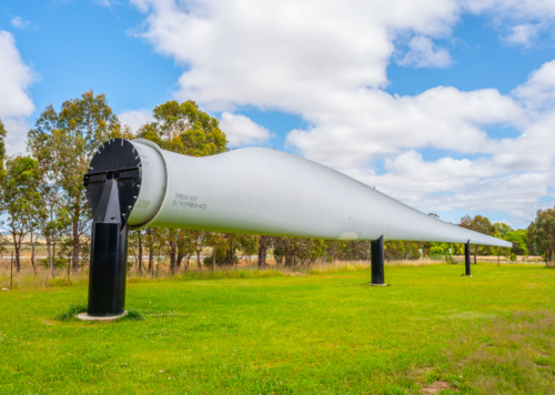 A 60 metre long broken blade from the White Rock wind farm has been installed as an attraction - Australian Stock Image