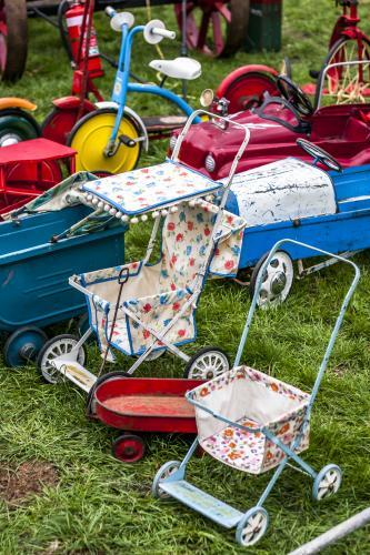 A collection of vintage prams, strollers and bikes - Australian Stock Image