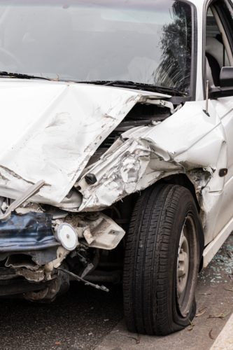 a crashed smashed car after an accident - Australian Stock Image
