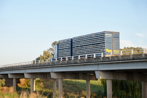 A  livestock truck on a bridge - Australian Stock Image
