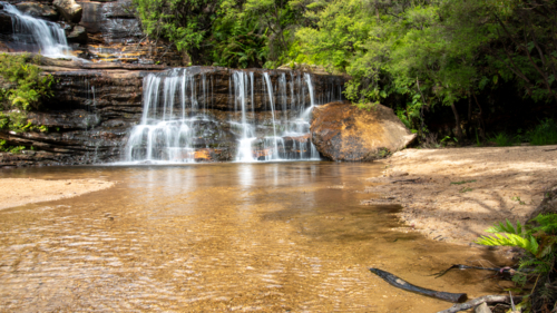 A long exposure of a waterfall near Wentworth Falls in the Blue Mountains - Australian Stock Image
