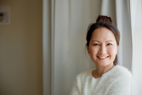 A portrait of a happy and cheerful woman - Australian Stock Image