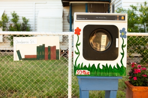 A residents old dryer used as a book swap in Winton - Australian Stock Image
