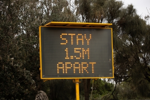 A sign during the COVID-19 corona virus pandemic which says 'stay 1.5m apart'