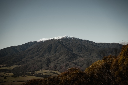 A snow-dusted Mt Bogong at the start of winter. - Australian Stock Image