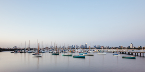 A summer sunset over Melbourne from St Kilda Pier in Victoria, Australia - Australian Stock Image