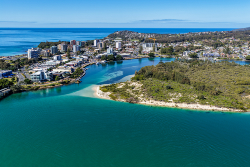 A sweeping aerial view of Wallis Lake and the town of Forster - Australian Stock Image