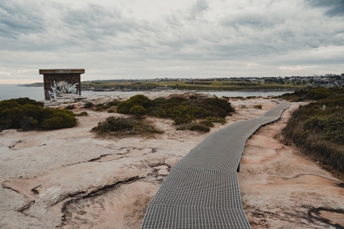 A walking track leading down to Malabar at Boora Point, Malabar. - Australian Stock Image