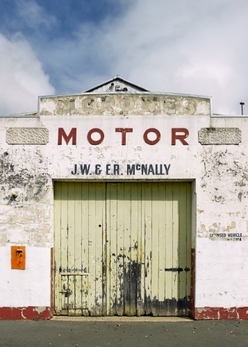 Abandoned motor garage in rural town - Australian Stock Image