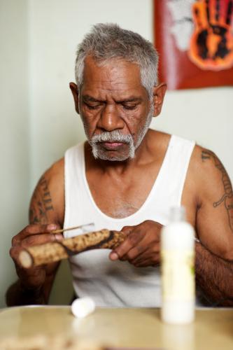 Aboriginal Artist at Work - Australian Stock Image