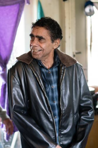 Aboriginal Elder Looking off to the Side while Smiling - Australian Stock Image