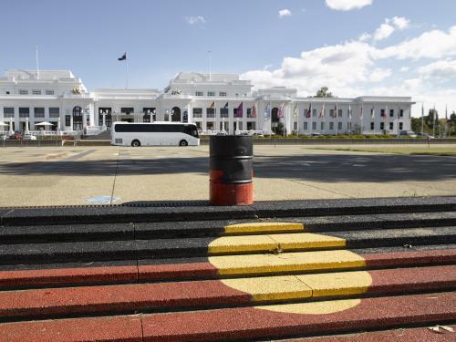 Aboriginal flag painted on steps leading to old parliament house - Australian Stock Image