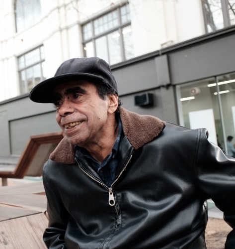 Aboriginal Man Smiling in an Urban Location - Australian Stock Image