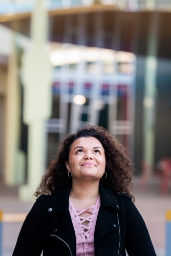 aboriginal woman, looking up - Australian Stock Image