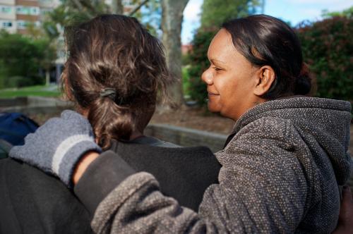 Aboriginal Woman with Her Arm around Another - Australian Stock Image