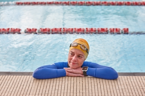 Active senior lady in swimming pool - Australian Stock Image