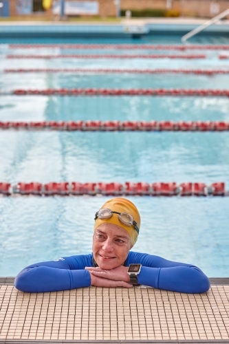 Active senior lady in swimming pool - Australian Stock Image