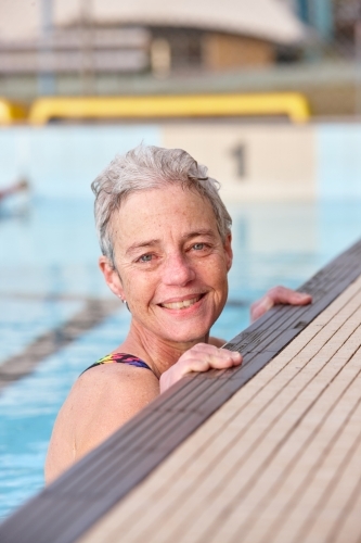 Active senior lady in swimming pool