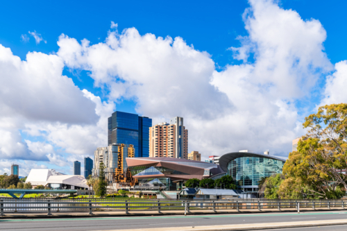 Adelaide Riverbank skyline viewed across Torrens river from Montefiore Bridge on a day - Australian Stock Image