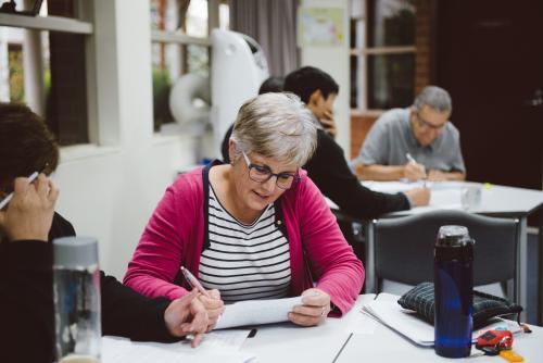 Adult students studying together at University