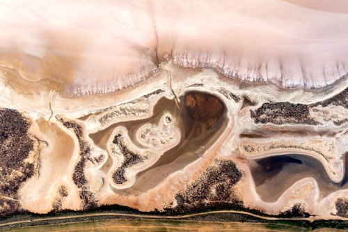 Aerial abstract of salt lake patterns and shoreline textures - Australian Stock Image