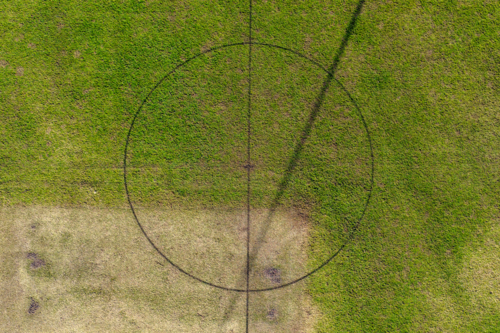 Aerial drone view directly above sports playing field at Maitland Park Sportsground. - Australian Stock Image