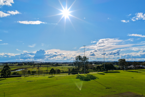 Aerial drone view of rural farmland and sporting fields in Maitland, New South Wales, Australia. - Australian Stock Image