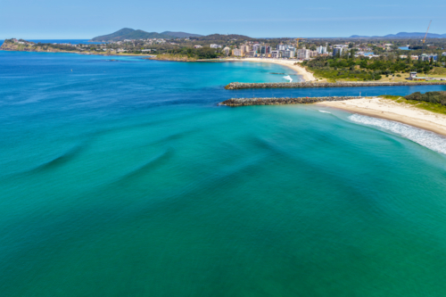 Aerial image capturing the Wallis Lake channel between Forster and Tuncurry - Australian Stock Image