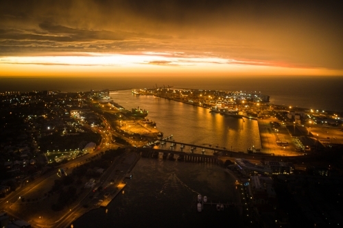 Aerial image of a port after sunset